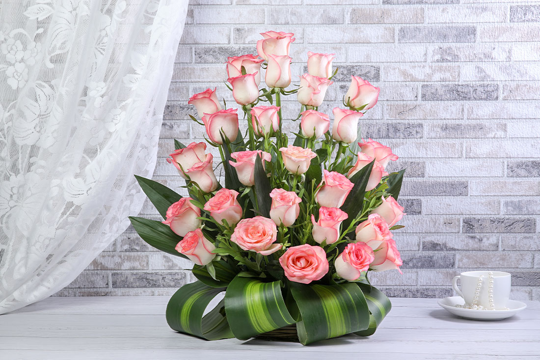 Ro. 23 1399 ( 25 pink roses Ijn basket)